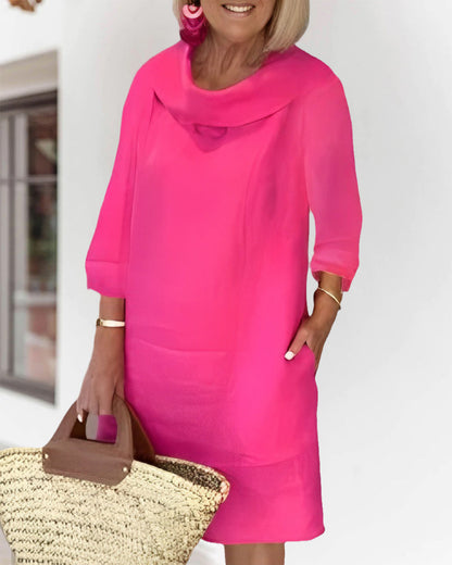 Solid color dress with round neckline