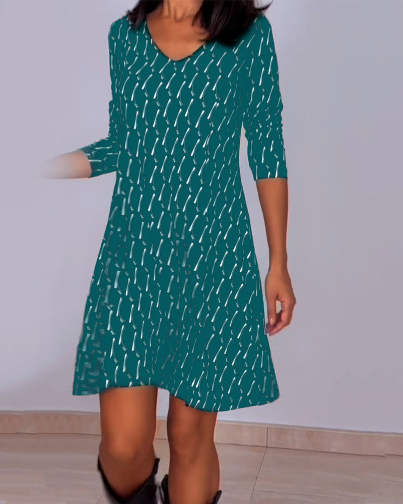 V-neck dress with diamond print