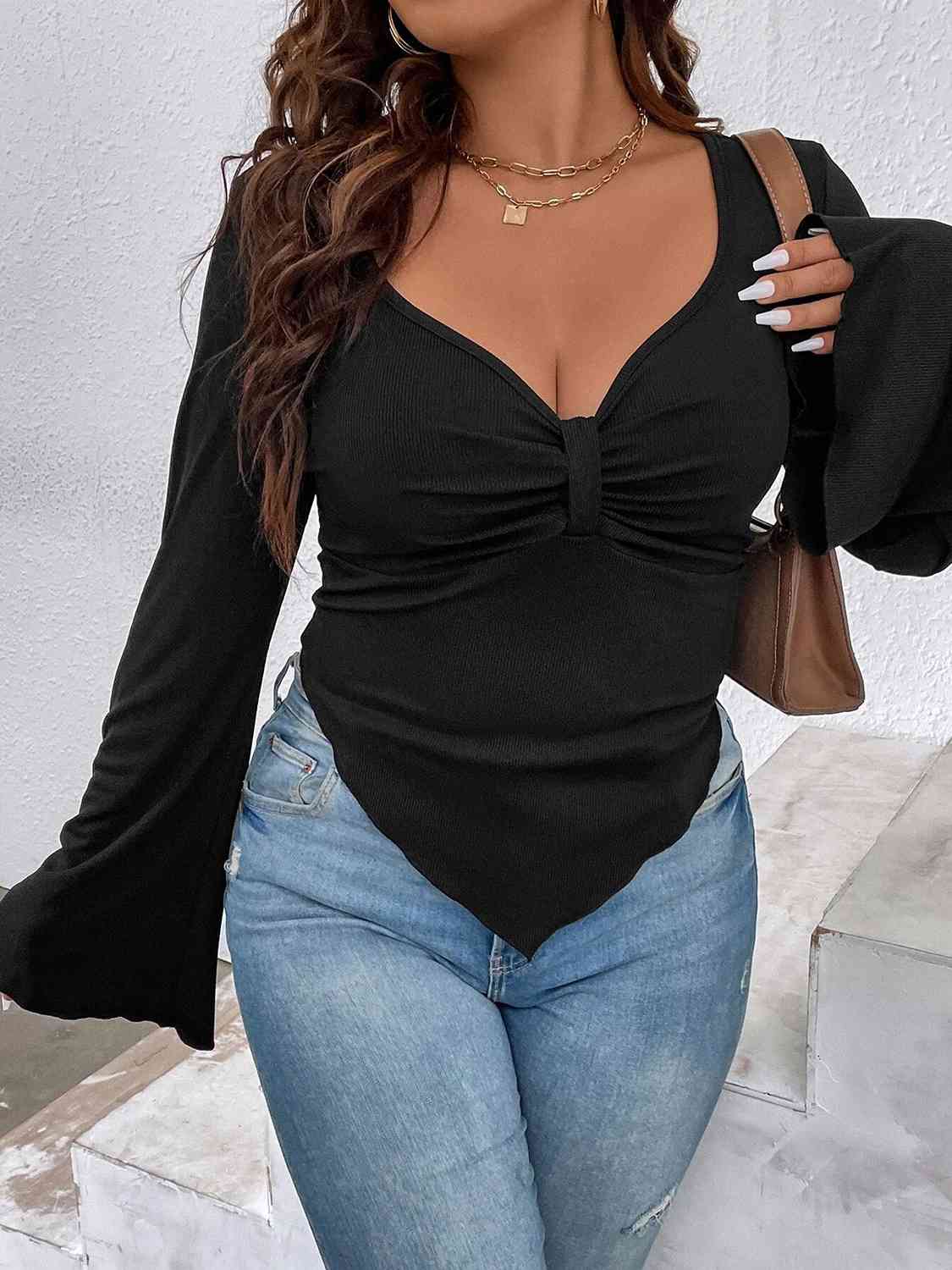 Top with Arm Plunge Flare Detail