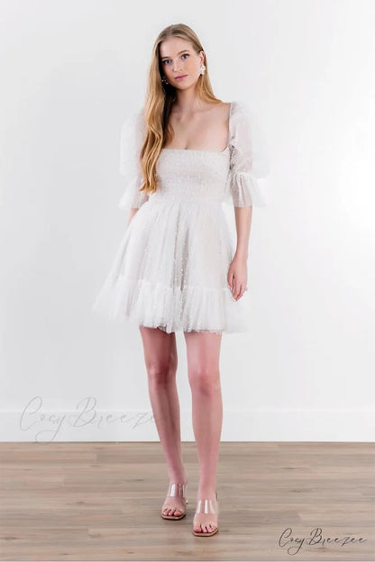 Devita Pearl Graceful Embellished Mini Dress