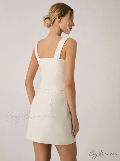 Elegant Pearl Graceful Buckle Mini Skirt