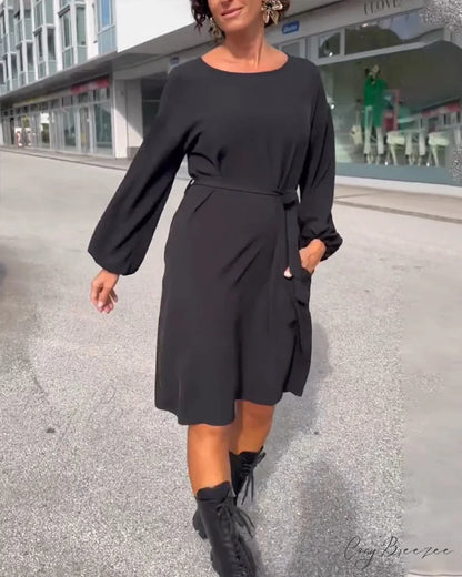 Solid color round neck tie dress