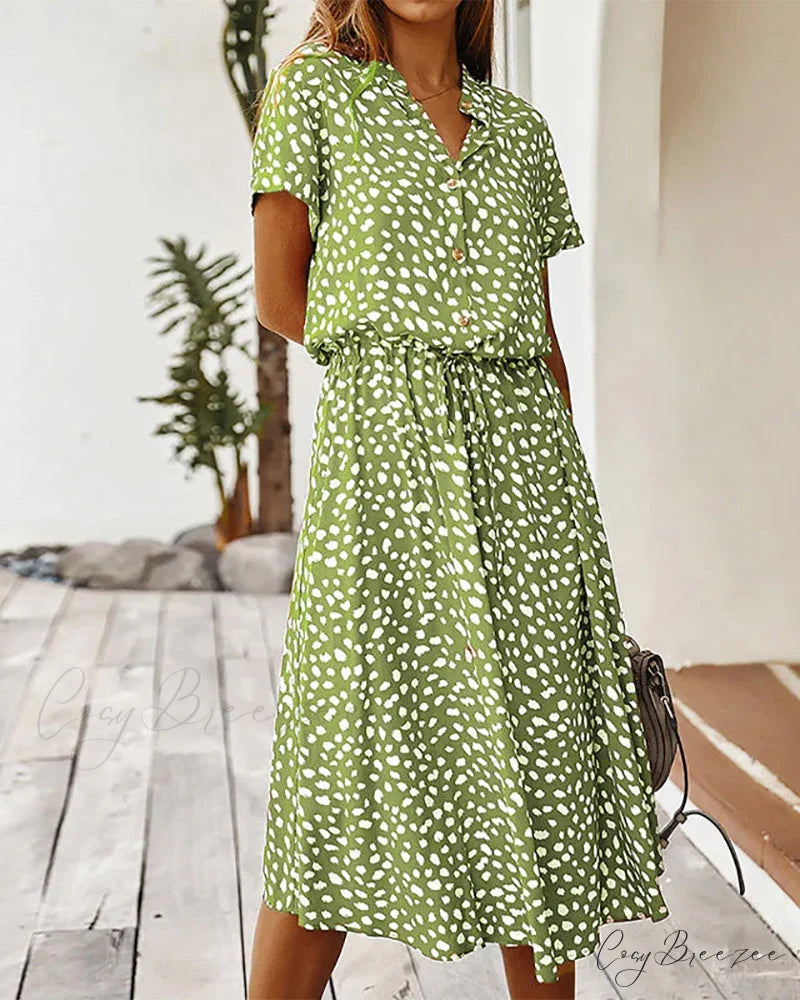 V-neck dress with dot print Input: Blue striped button-up shirt Output: Button-up shirt with blue stripes Input: Floral