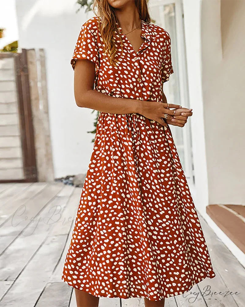V-neck dress with dot print Input: Blue striped button-up shirt Output: Button-up shirt with blue stripes Input: Floral