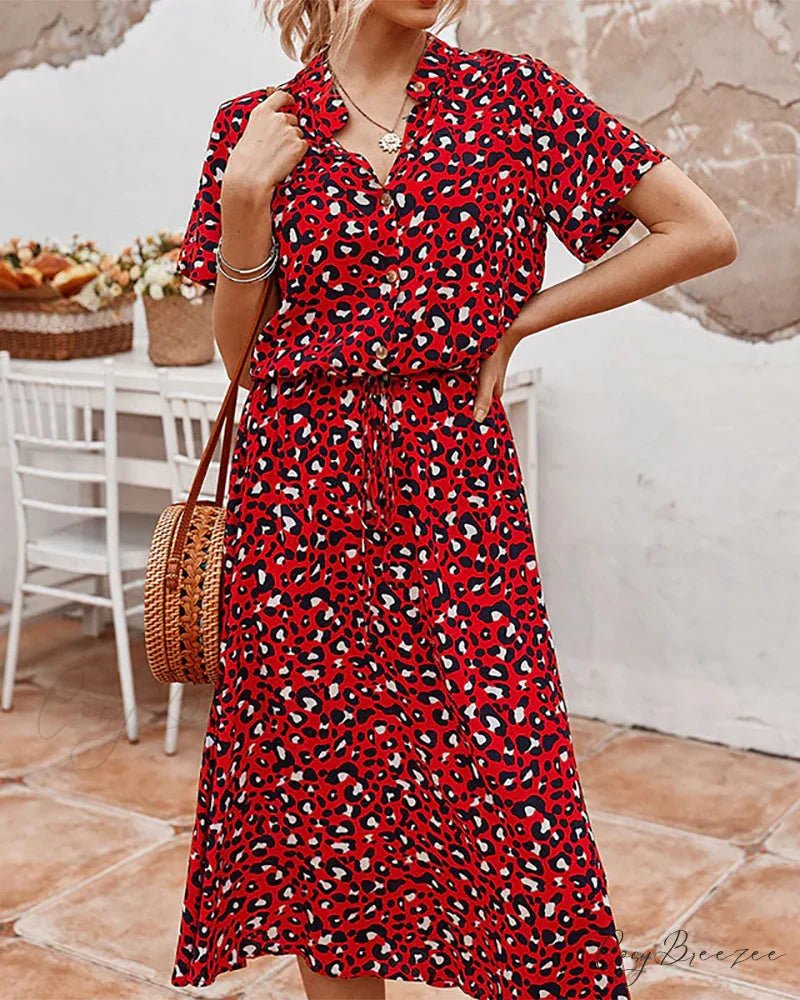 V-neck dress with dot print Input: Blue striped button-up shirt Output: Button-up shirt with blue stripes Input: Floral