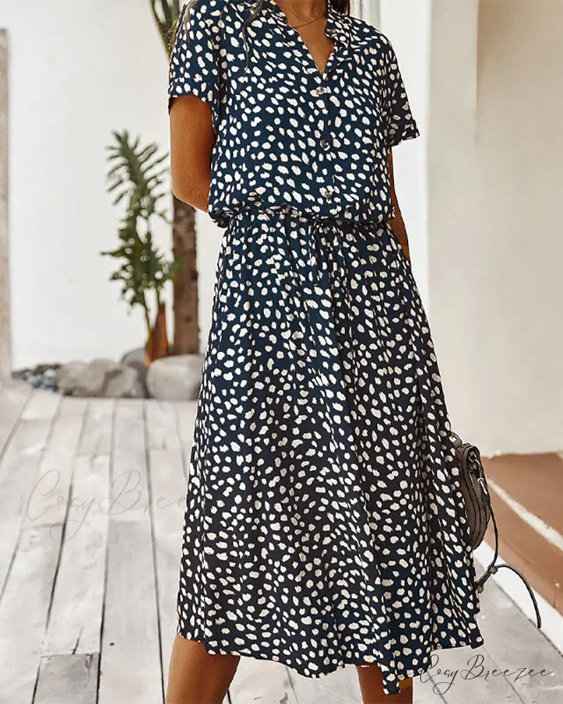 V-neck dress with dot print Input: Blue striped button-up shirt Output: Button-up shirt with blue stripes Input: Floral