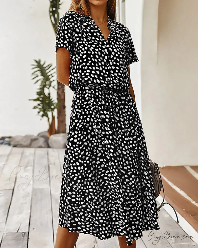 V-neck dress with dot print Input: Blue striped button-up shirt Output: Button-up shirt with blue stripes Input: Floral