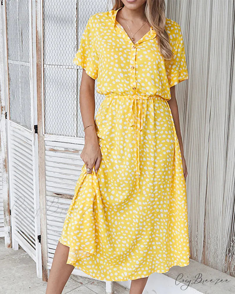 V-neck dress with dot print Input: Blue striped button-up shirt Output: Button-up shirt with blue stripes Input: Floral